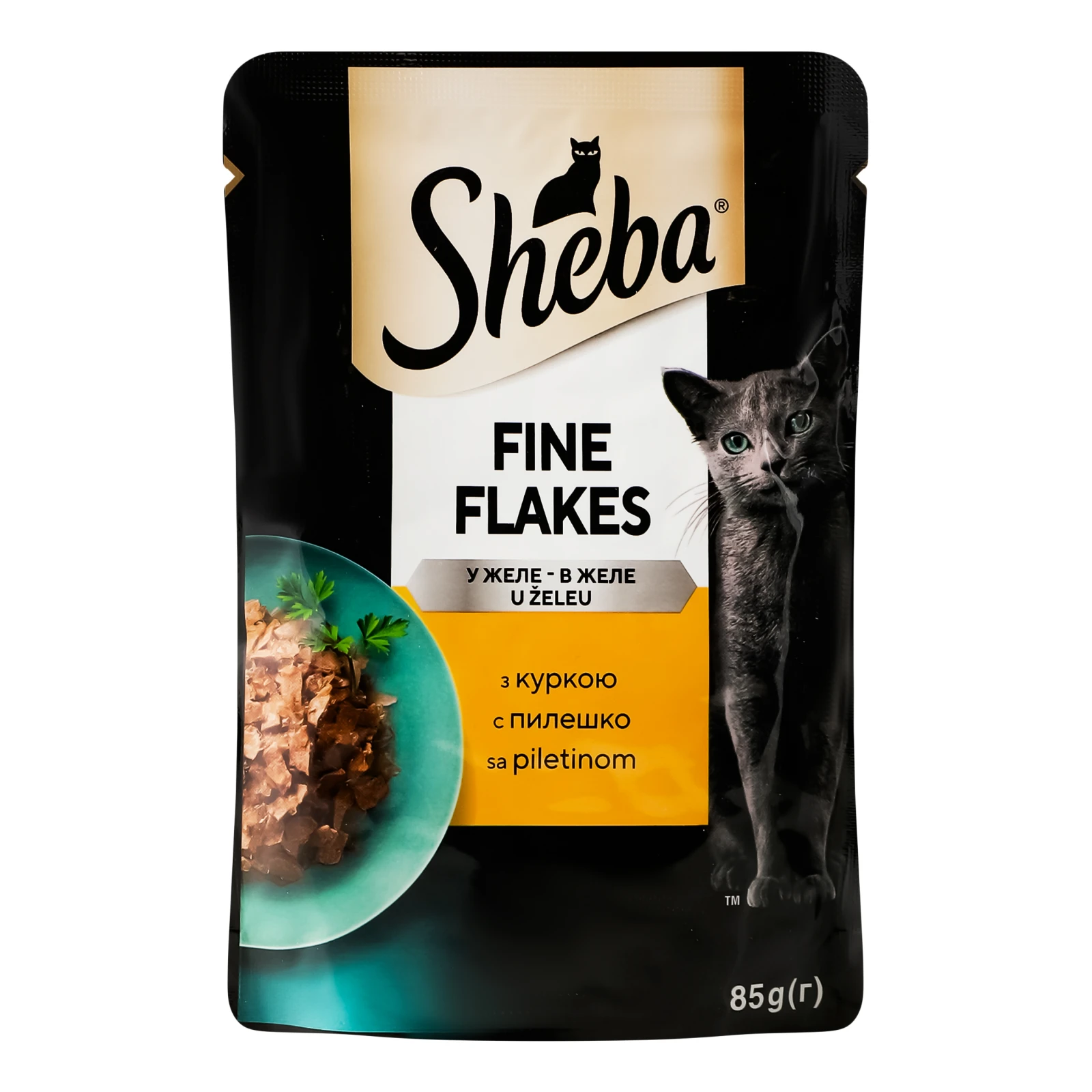 Корм для котів Sheba Ніжні шматочки консервований повнораціонний для дорослих котів З куркою в желе 85г