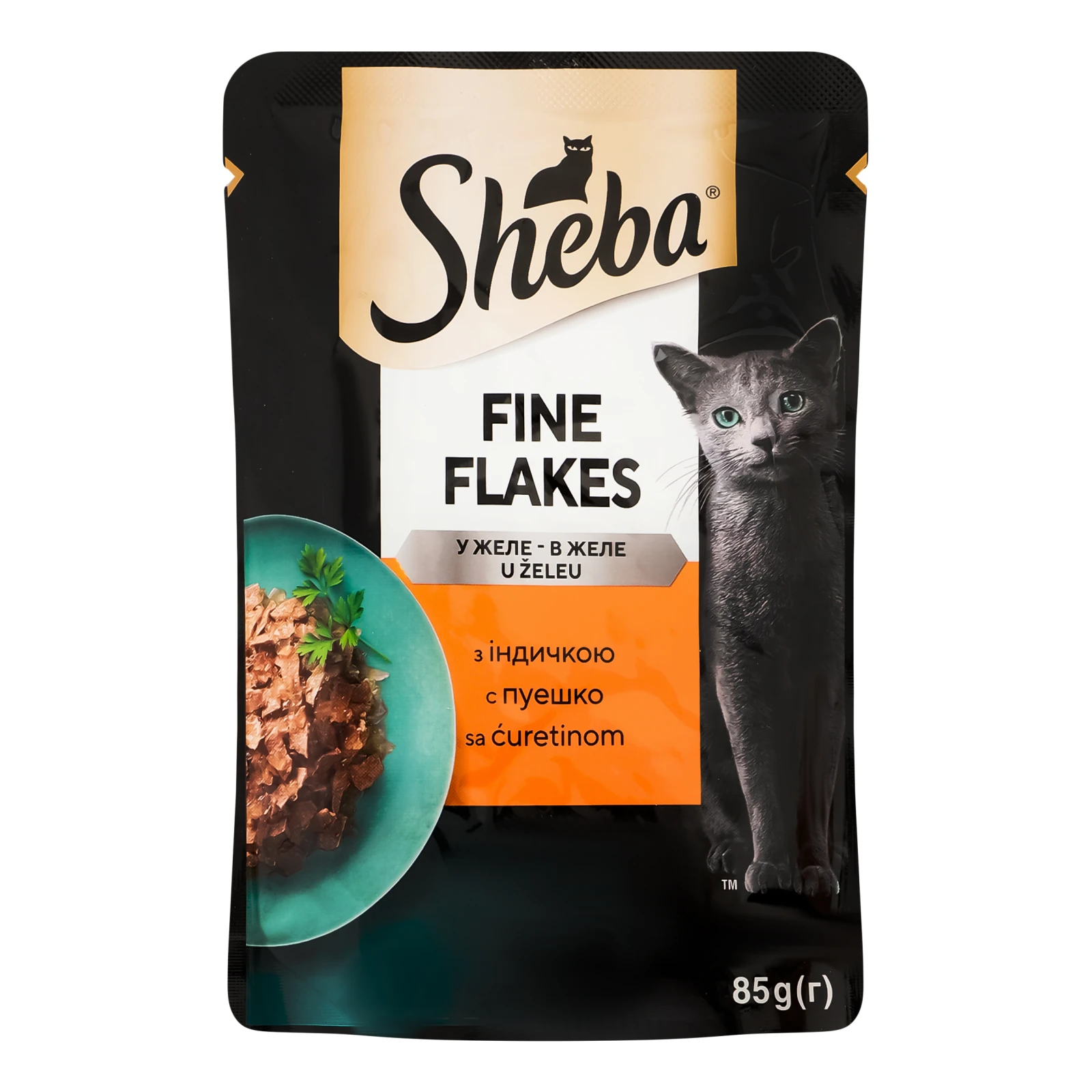 Корм для котів Sheba Ніжні шматочки консервований повнораціонний для дорослих котів З індичкою в желе 85г